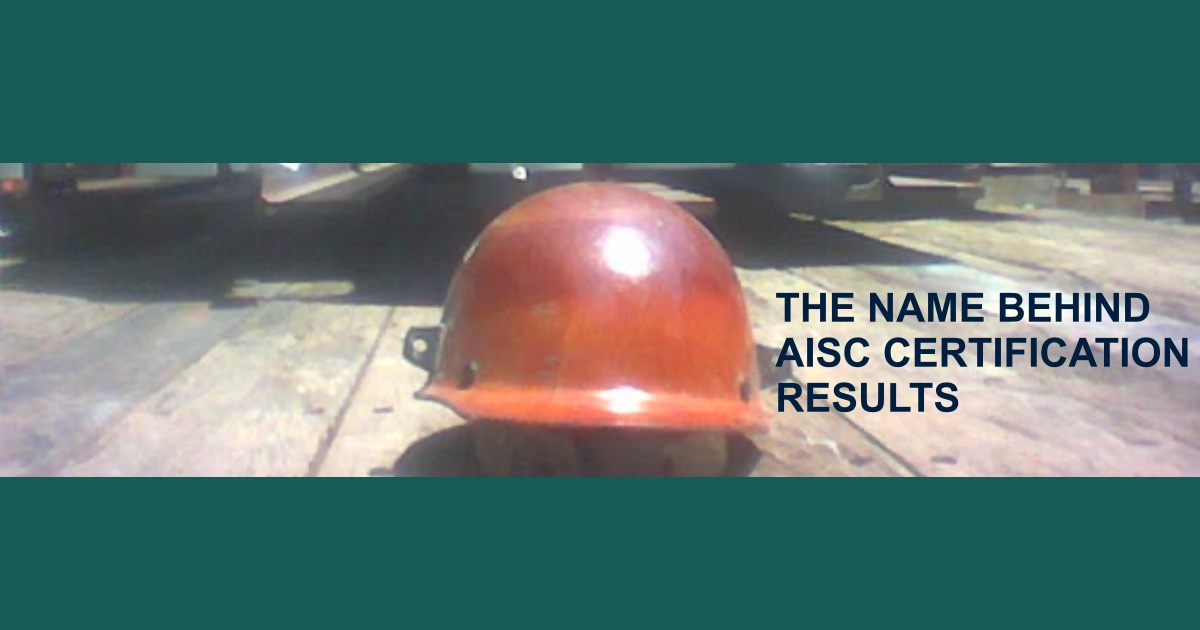 An ironworker's hardhat sitting on the flatbed truck behind a load of steel while he takes a break from the AIC certification audit process.